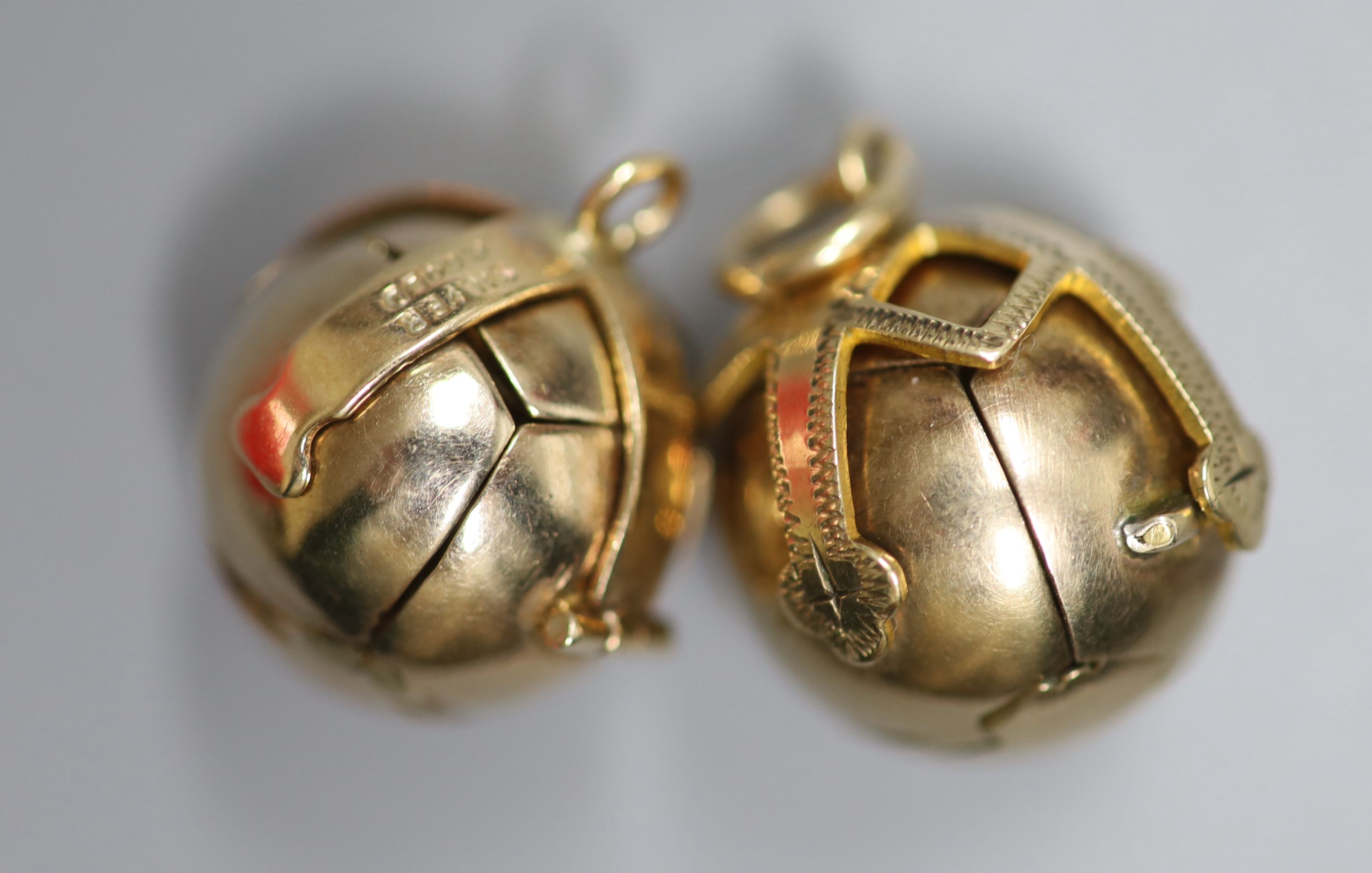 Two yellow and white metal masonic ball pendants, largest diameter 18mm, gross 20.5 grams.